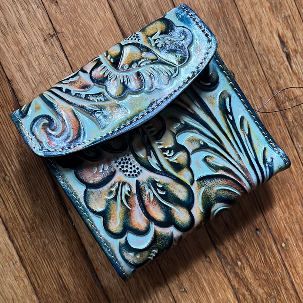 Patrica Nash tooled trifold leather wallet with kiss clasp.